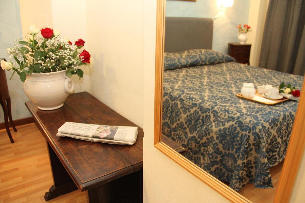 Gemini Camere E Suites Grosseto Bilik gambar
