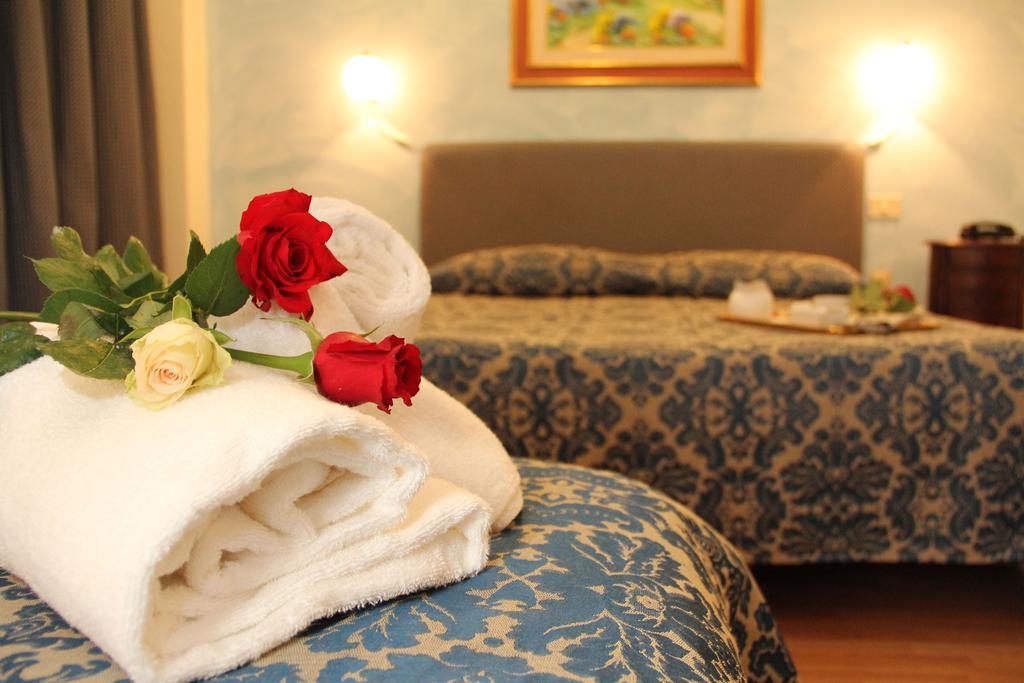 Gemini Camere E Suites Grosseto Bilik gambar