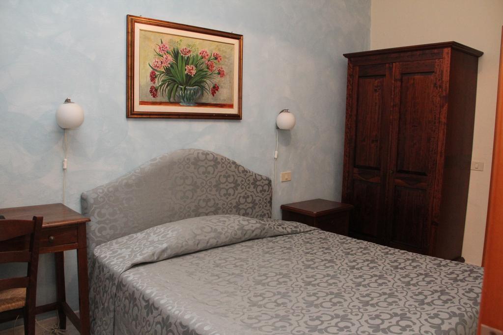Gemini Camere E Suites Grosseto Bilik gambar