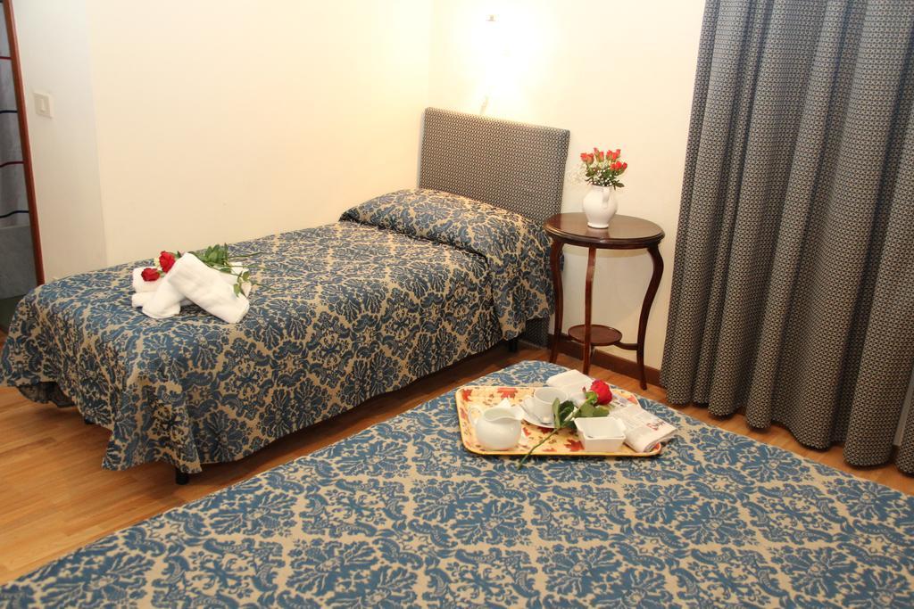 Gemini Camere E Suites Grosseto Bilik gambar